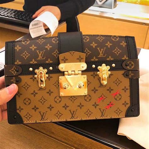 lv trunk clutch or cannes